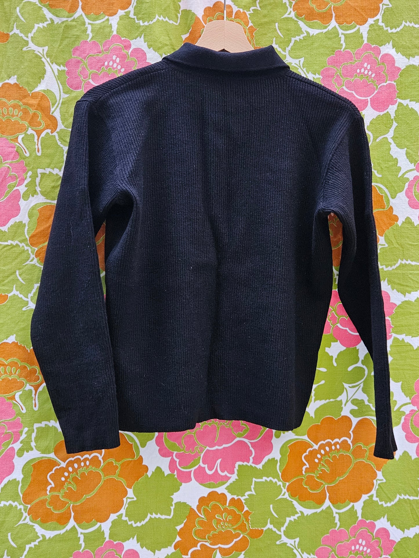 Pull noir col zippé
