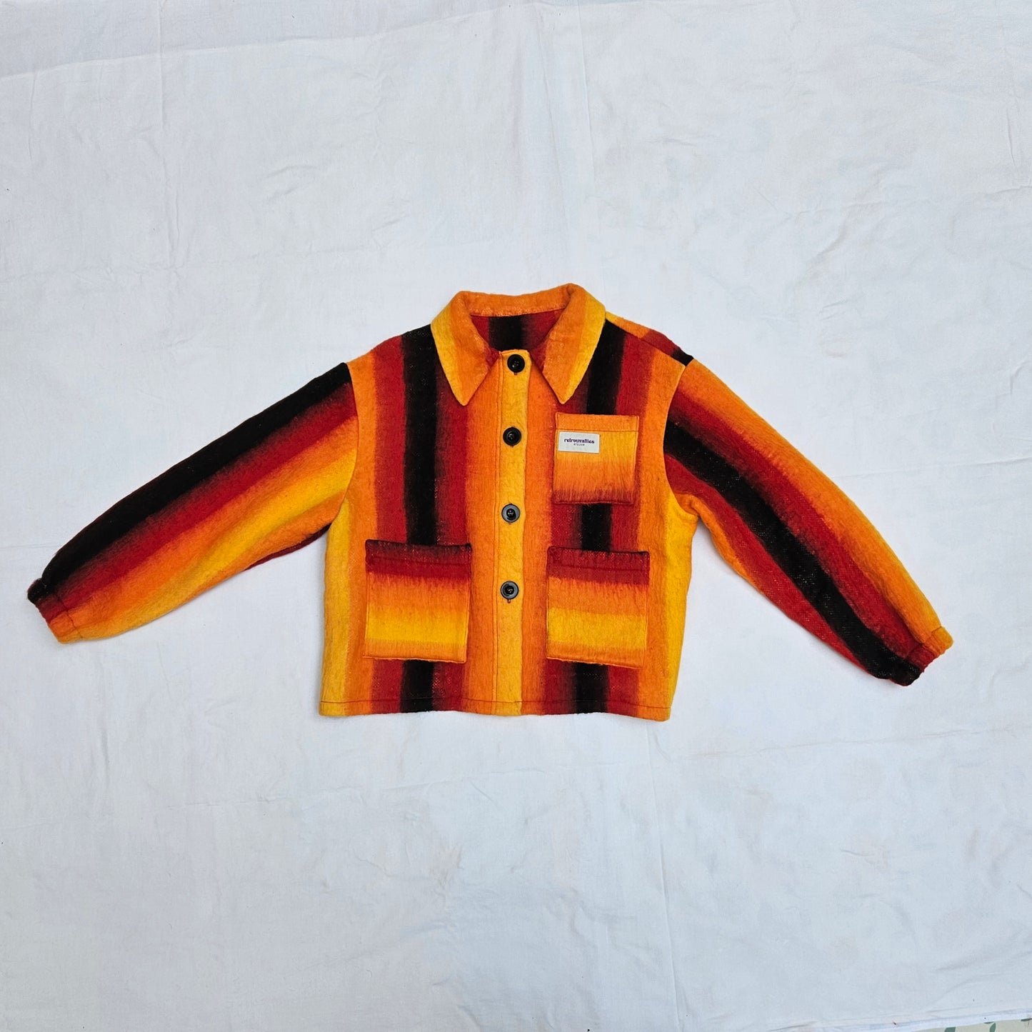 Veste couverture rayée
