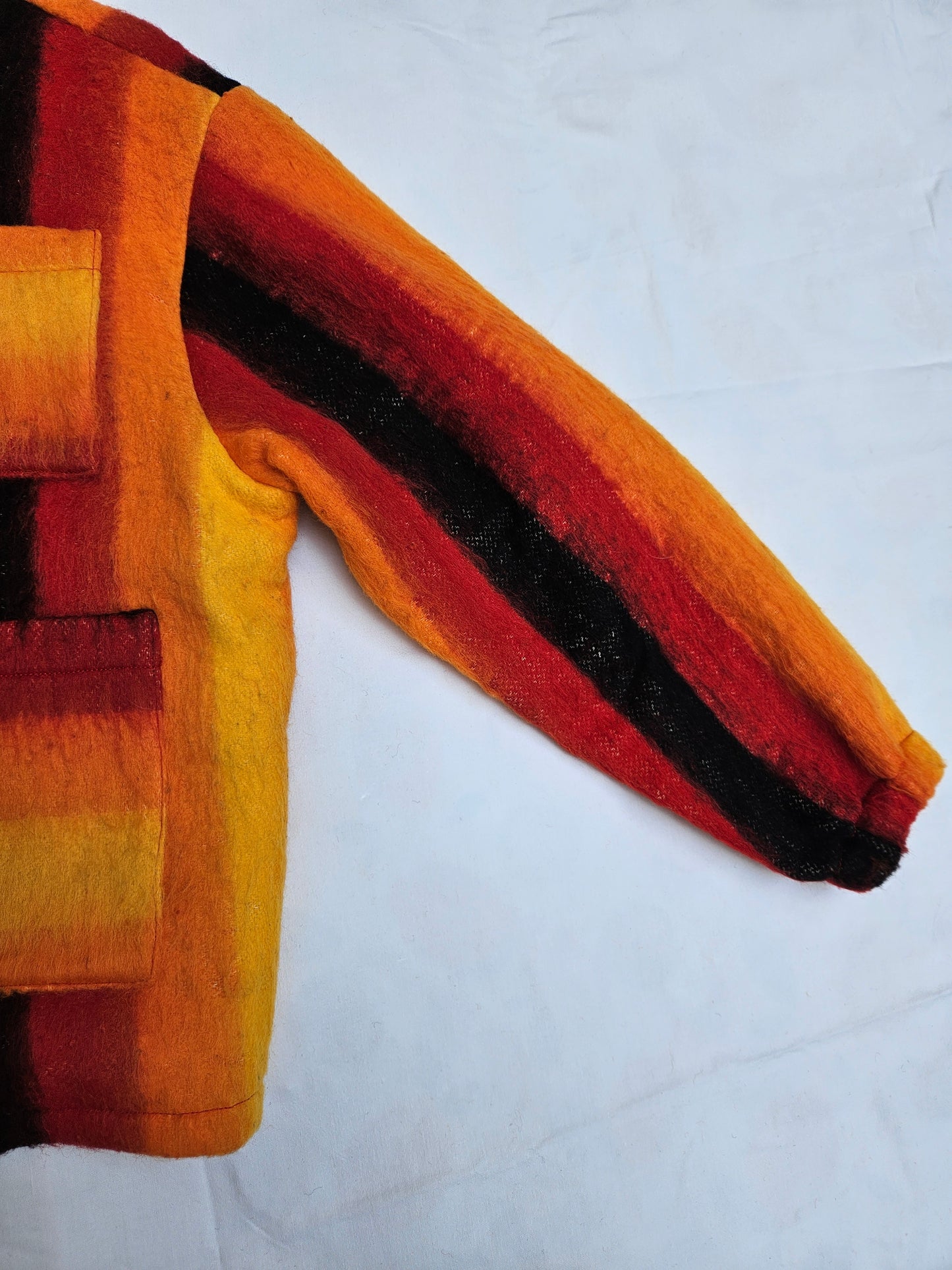Veste couverture rayée