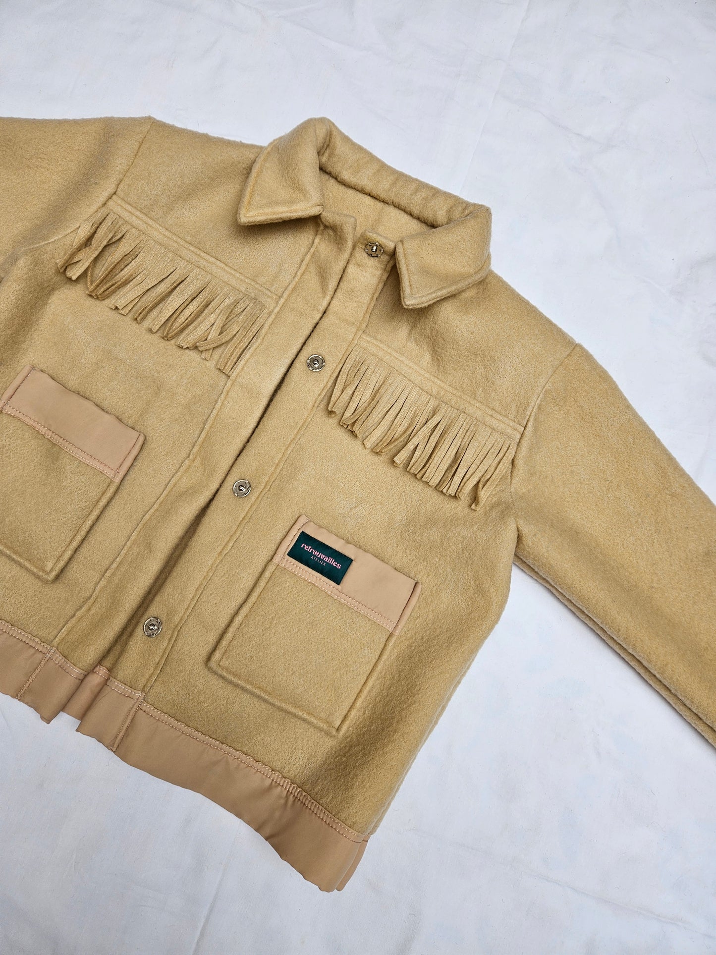 Veste couverture à franges