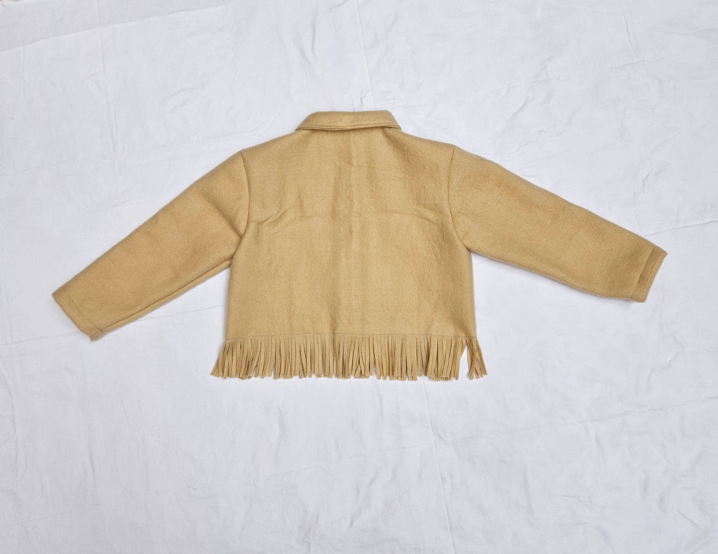 Veste couverture à franges