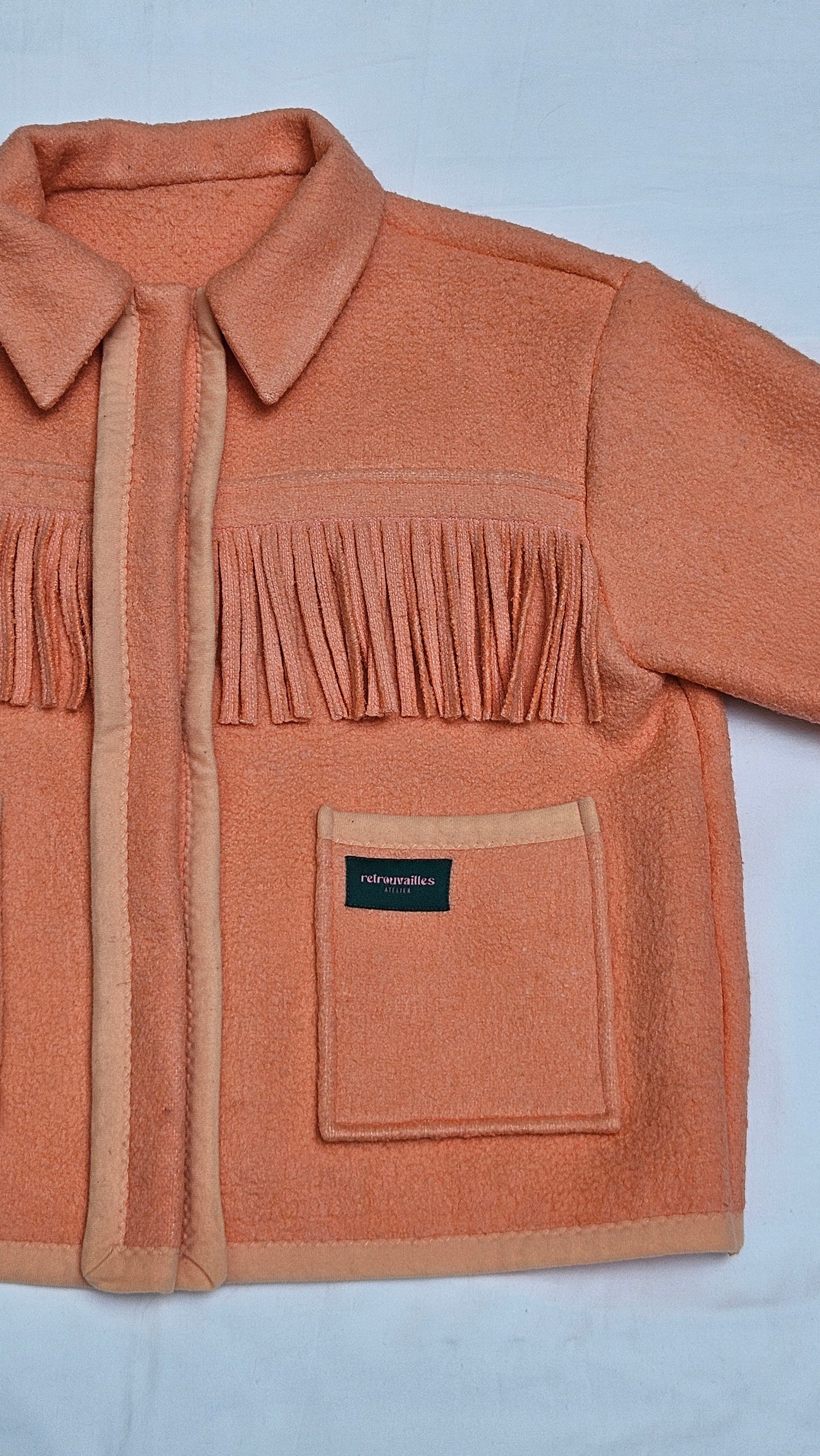 Veste couverture à franges