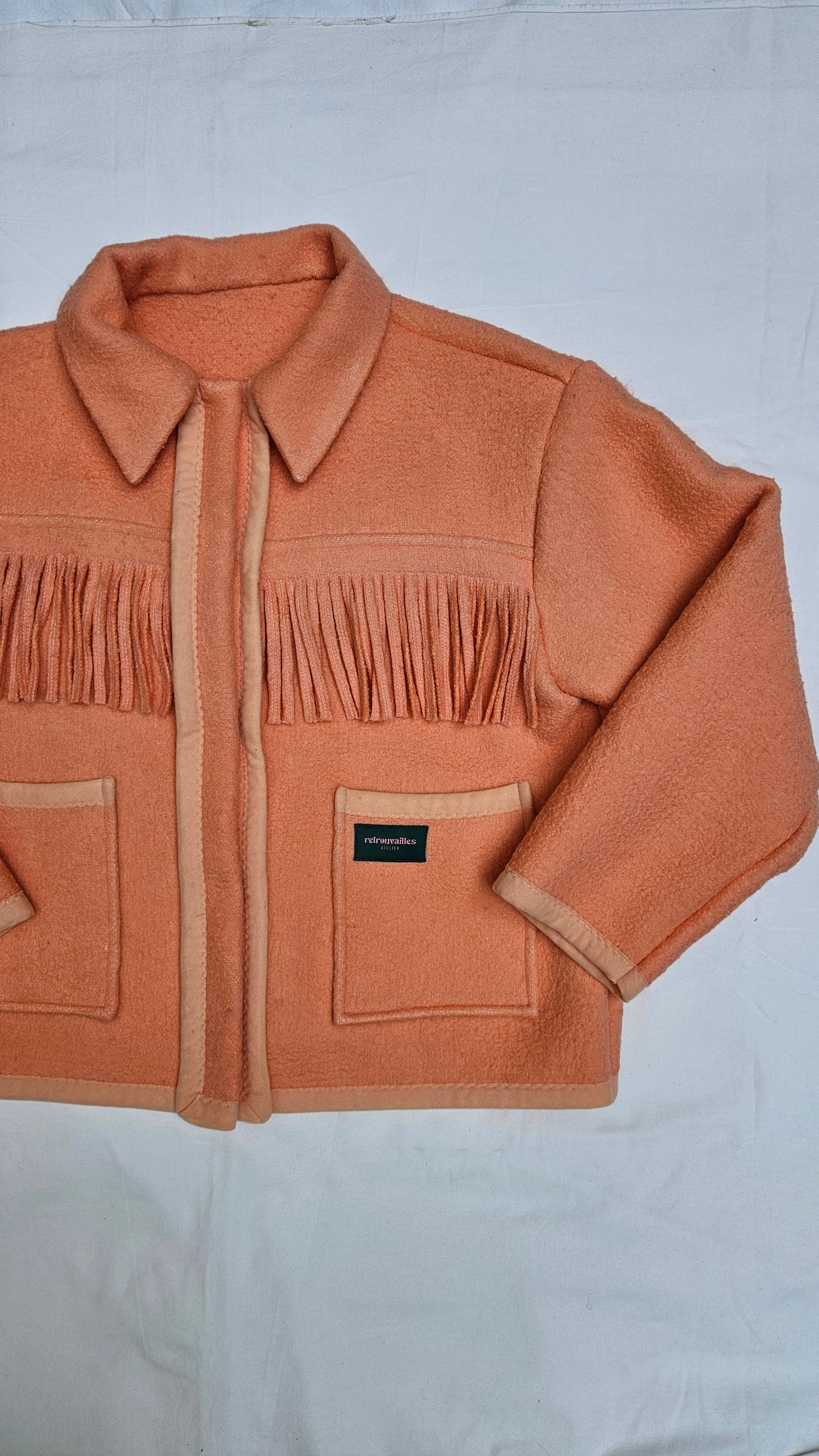 Veste couverture à franges