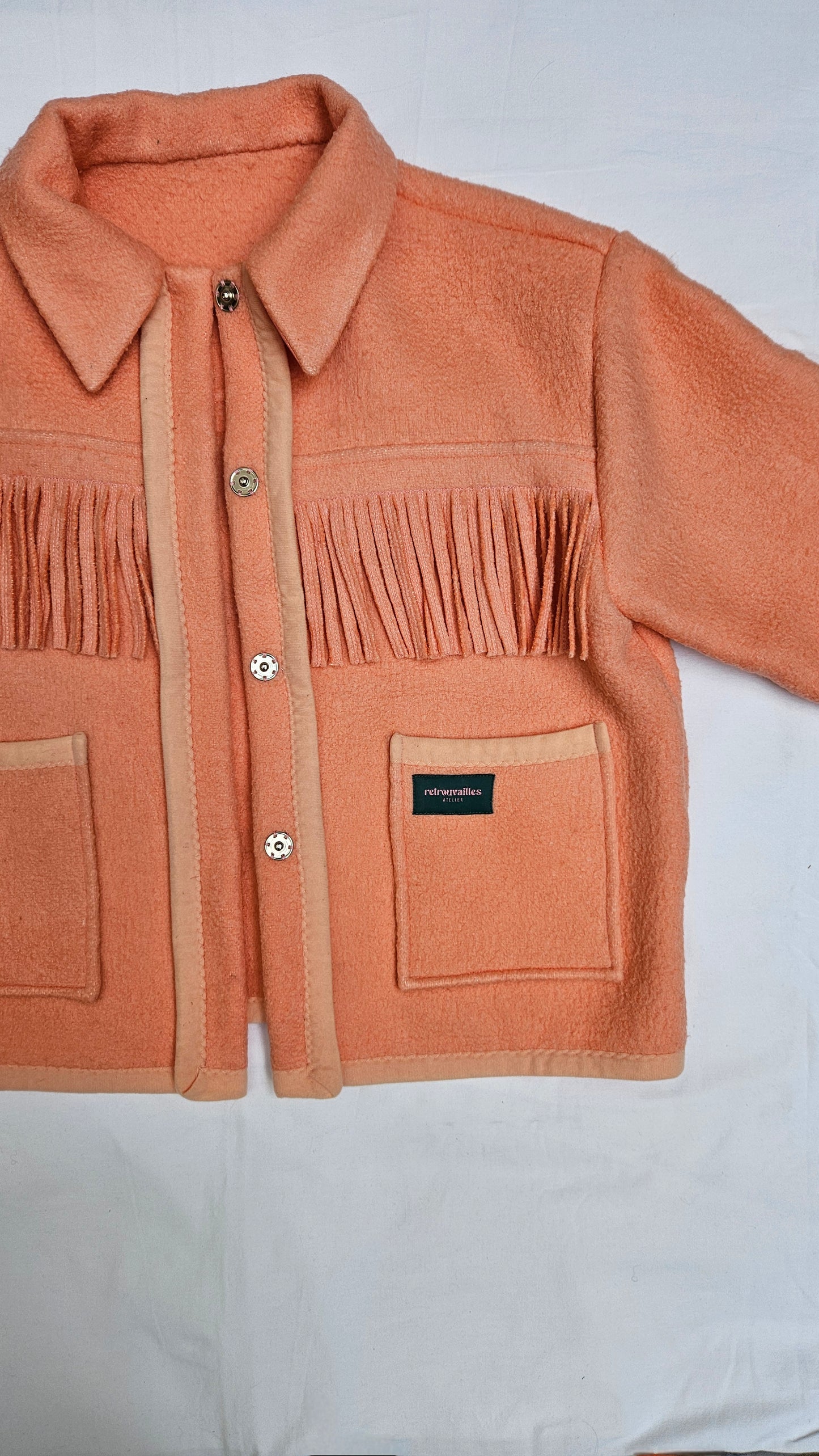 Veste couverture à franges