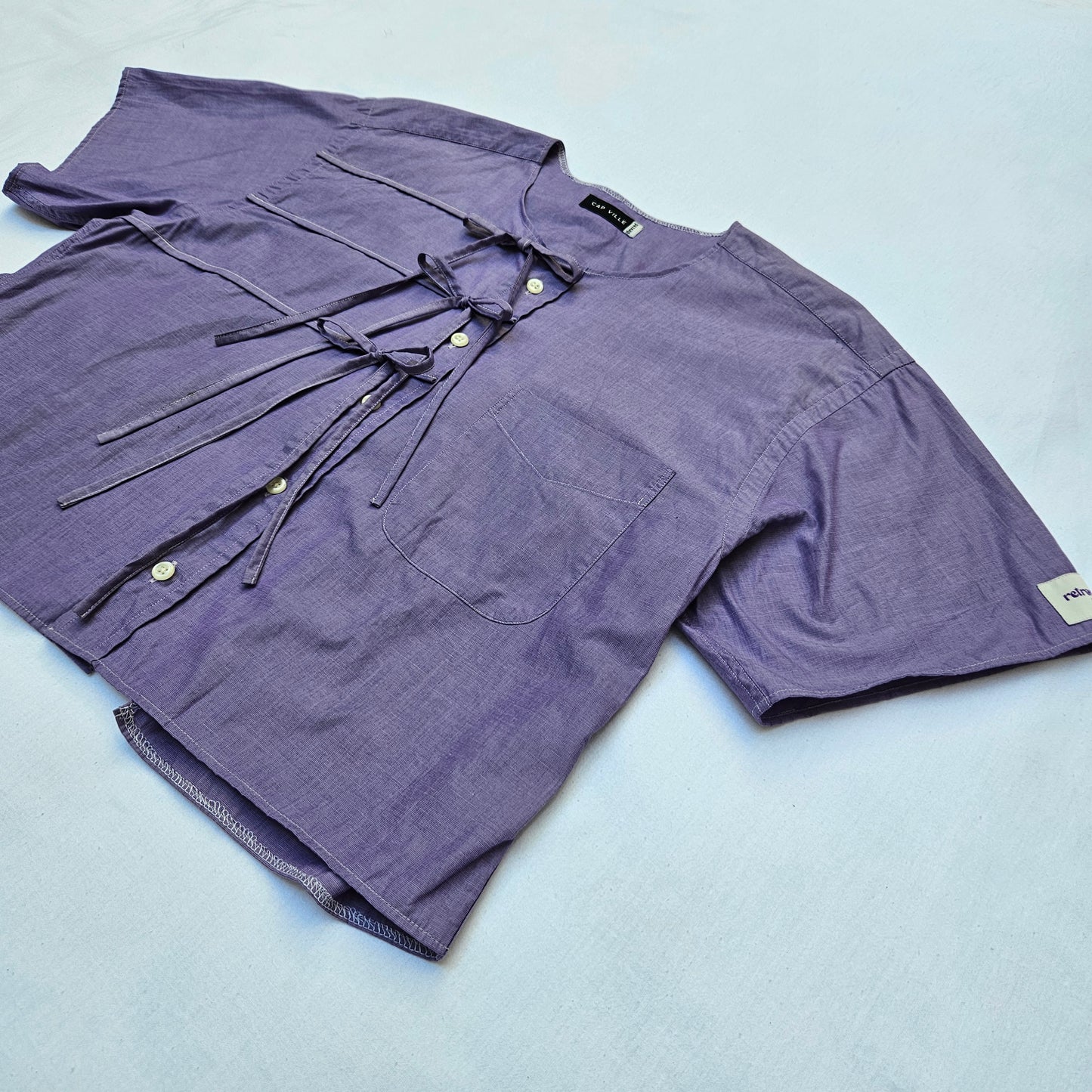 Blouse violette dos nu