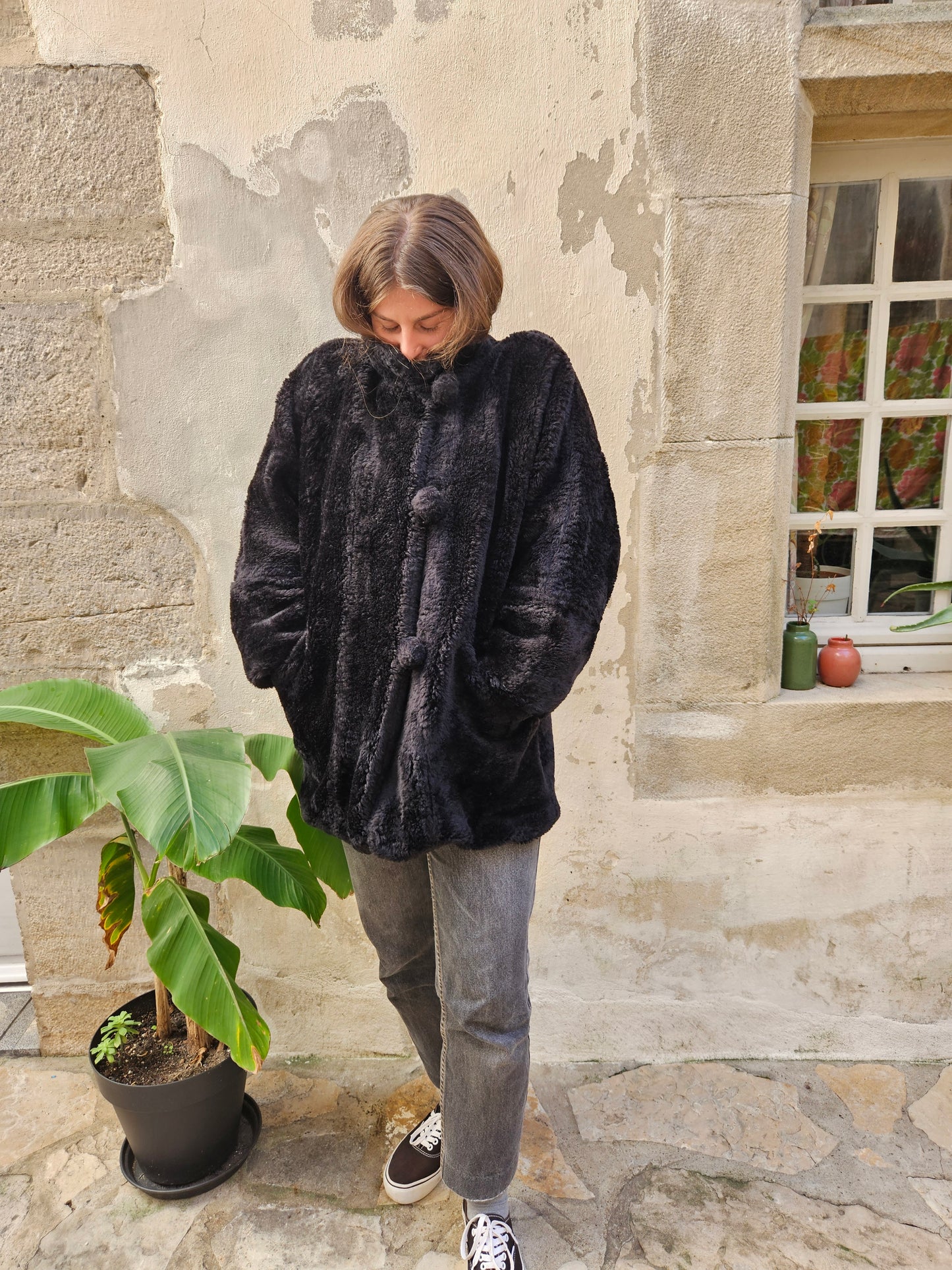 Manteau fausse fourrure
