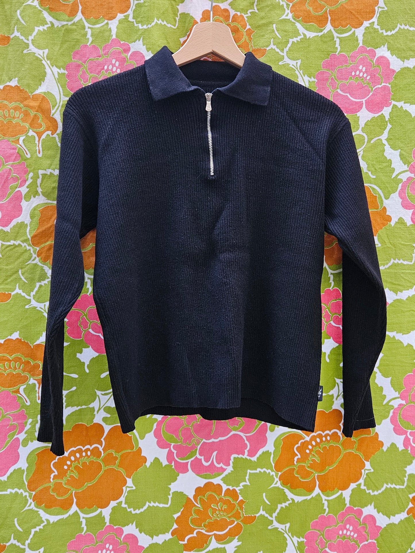 Pull noir col zippé