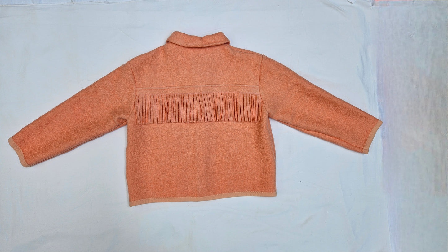 Veste couverture à franges