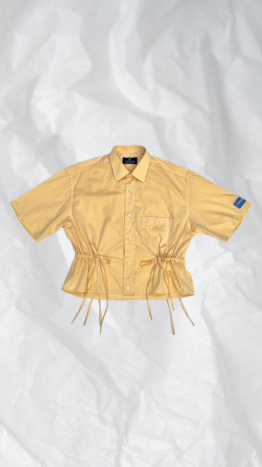 Blouse jaune à nouer