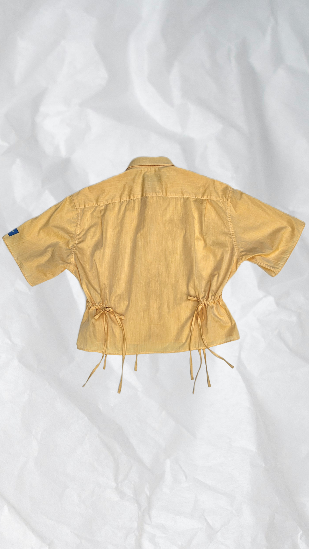 Blouse jaune à nouer