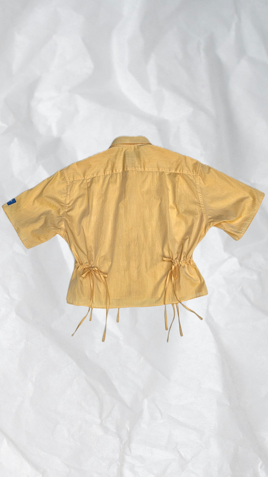 Blouse jaune à nouer